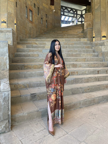 TFC Caftan statement prints, color play and thematic details embodying the true spirit of the TFC. Oversized Crepe Silk non sheer premium fabric absolutely must have for this season.