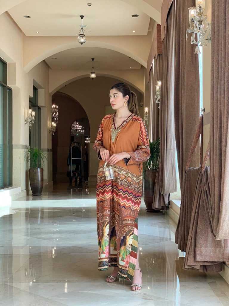 TFC Baysafar Our statement prints, color play and thematic details embodying the true spirit of the TFC. Crepe Silk non sheer premium fabric with embellished neckline of pearls, dabka, kora and cut dana.